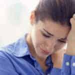 A stressed woman looks desperate