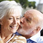 Middle aged man kiss his wife's cheek