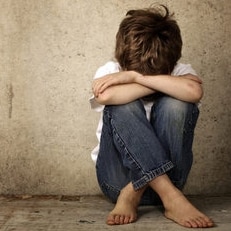 Lonely boy crying quietly