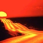 A long road with a big red sky and sun in the distance