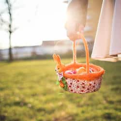 Basket with colored Easter eggs