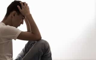A depressed young man.