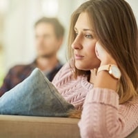 Woman feeling lonely in a relationship.