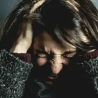 A woman being anxious.
