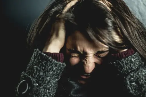 A woman being anxioius.