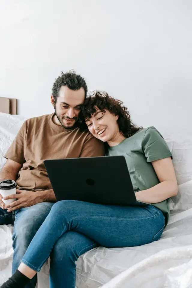 A couple having a counselling session online.