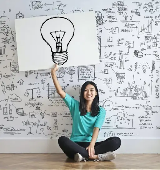 life-coaching-girl-with-light-bulb A girl thinking of strategies with life coaching.