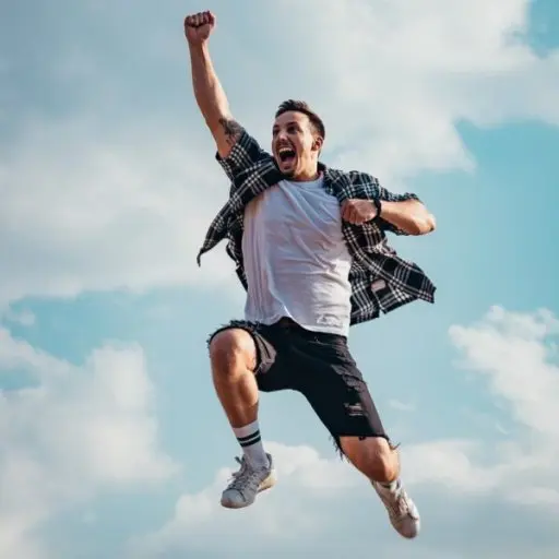 A man jumps up with enthusiasm.